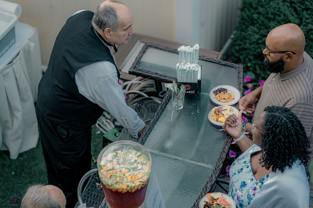 Diverse group of professionals discussing around a table